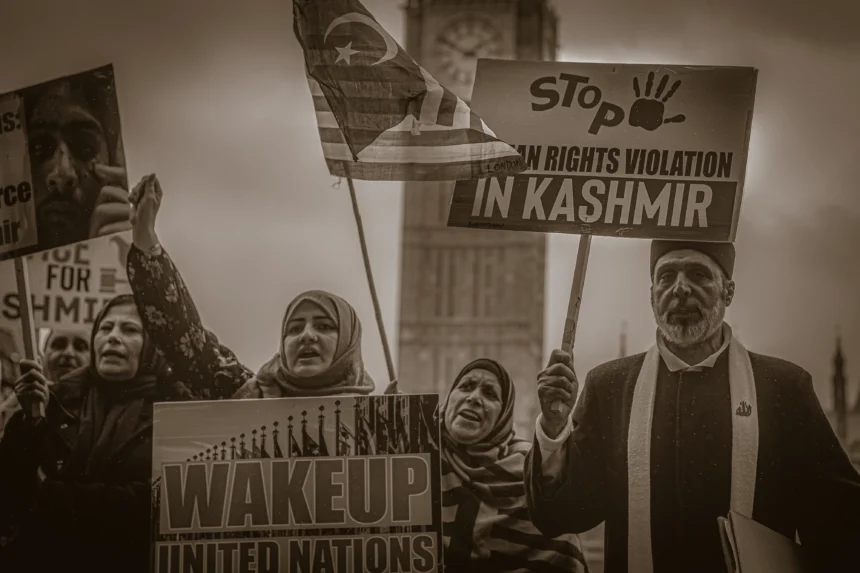 Activists demanding an end to human rights violations in Kashmir during a protest in central London scaled 1
